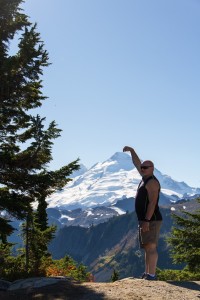 Don Cummins touching the top of Mount Baker.